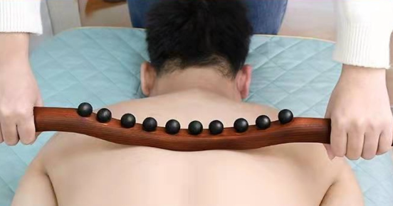 Trä lymfmassagestång