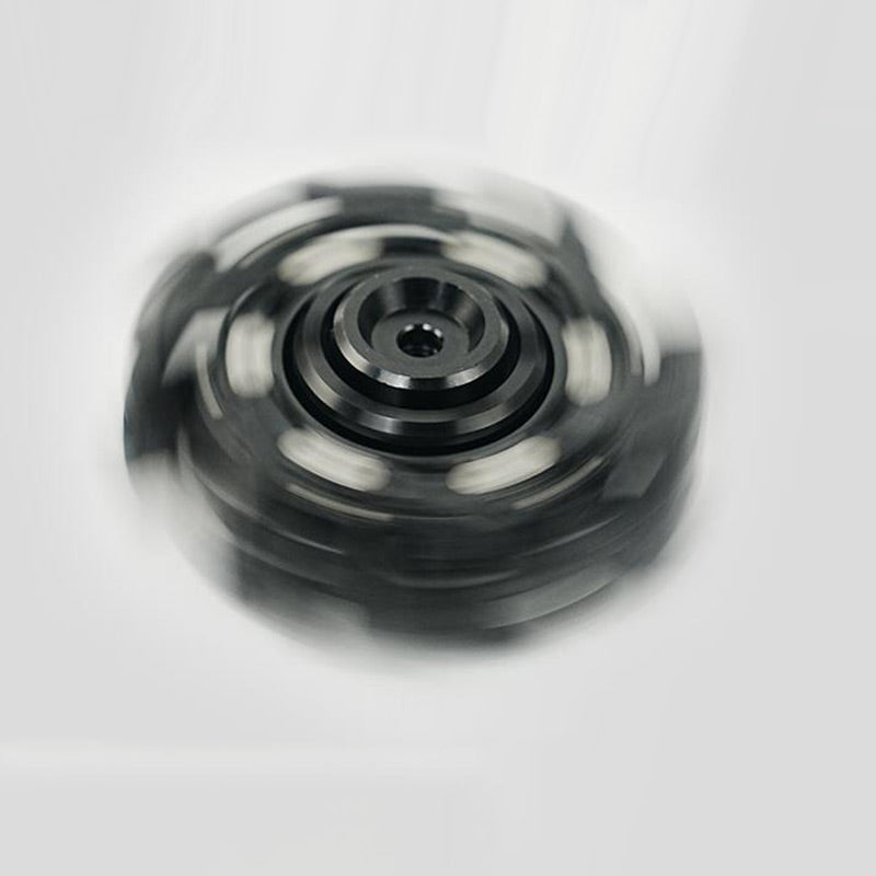 Kreativ fidget-skjutleksak med öppet hölje och snurra